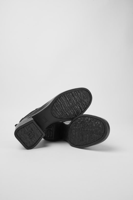 дизајн кишне црне кожне глежњаче са штиклама кампер